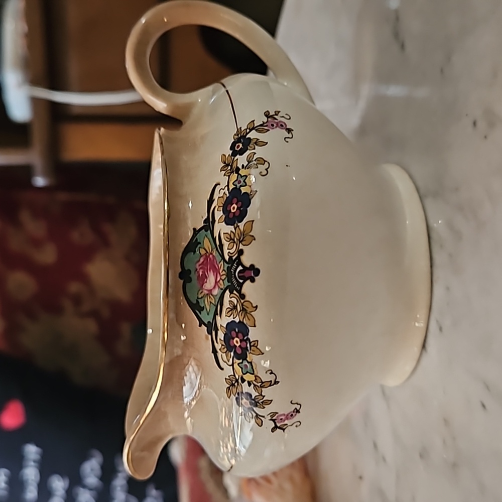 1766 marked Antique Edwin Knowles English trimmed floral saddle creamer